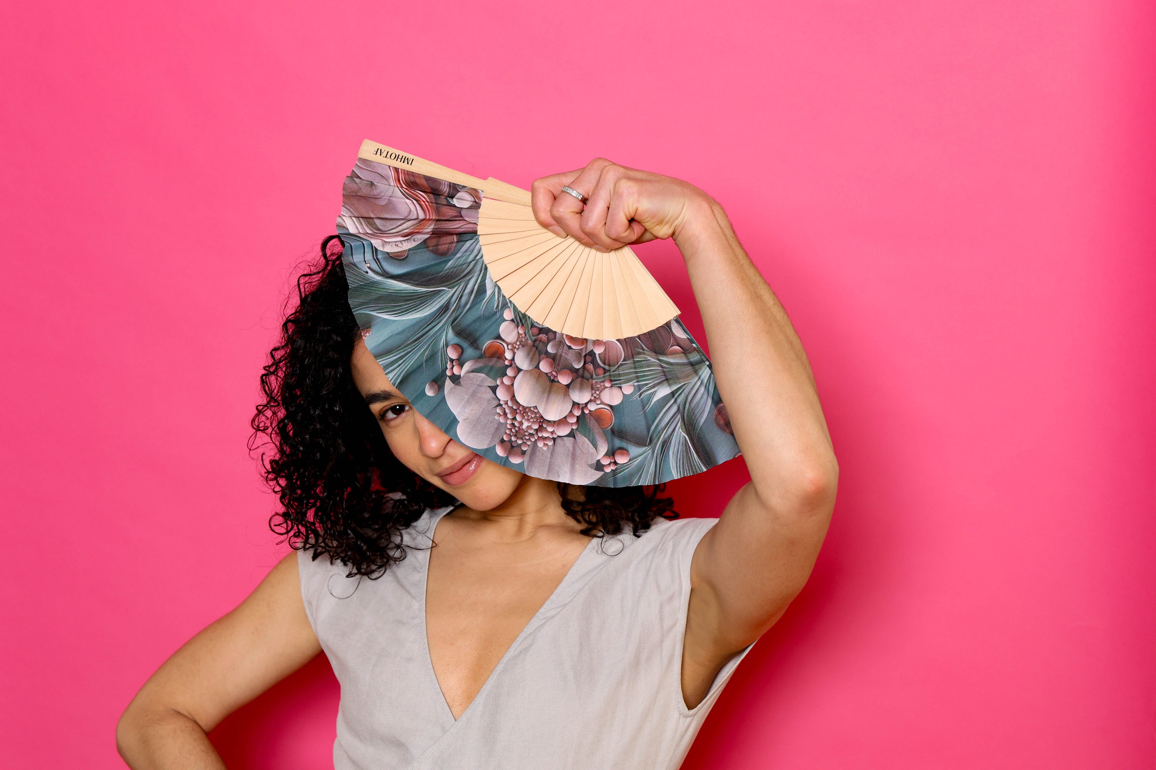 Pebble Oasis Hand Fan